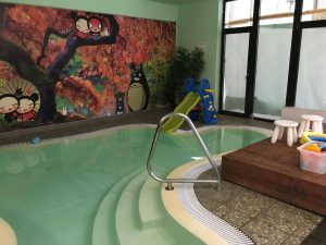 Detský bazén so šmýkačkou v hoteli Oxigén Noszvaj